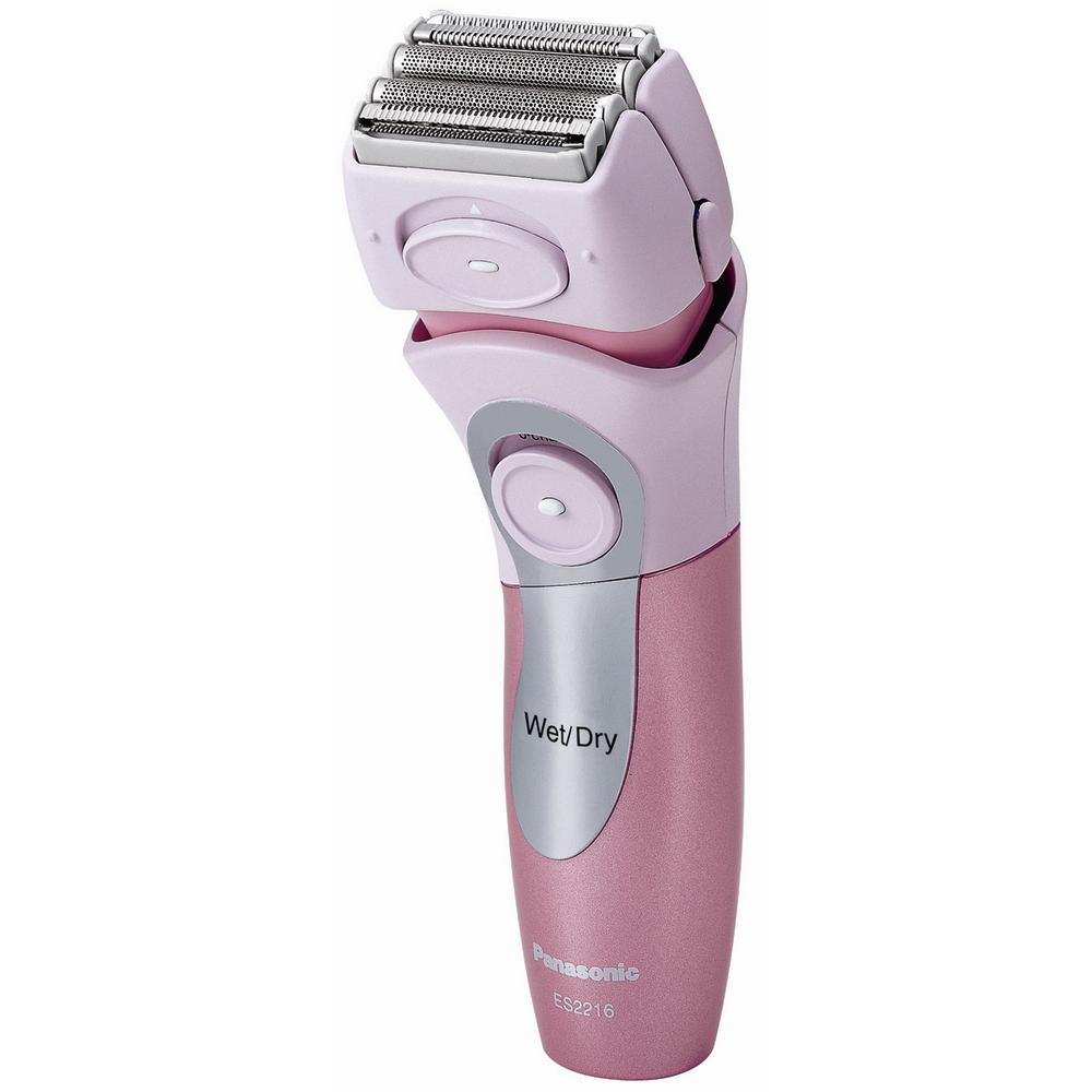 A pink electric shaver with rows of foils on the head of the shaver